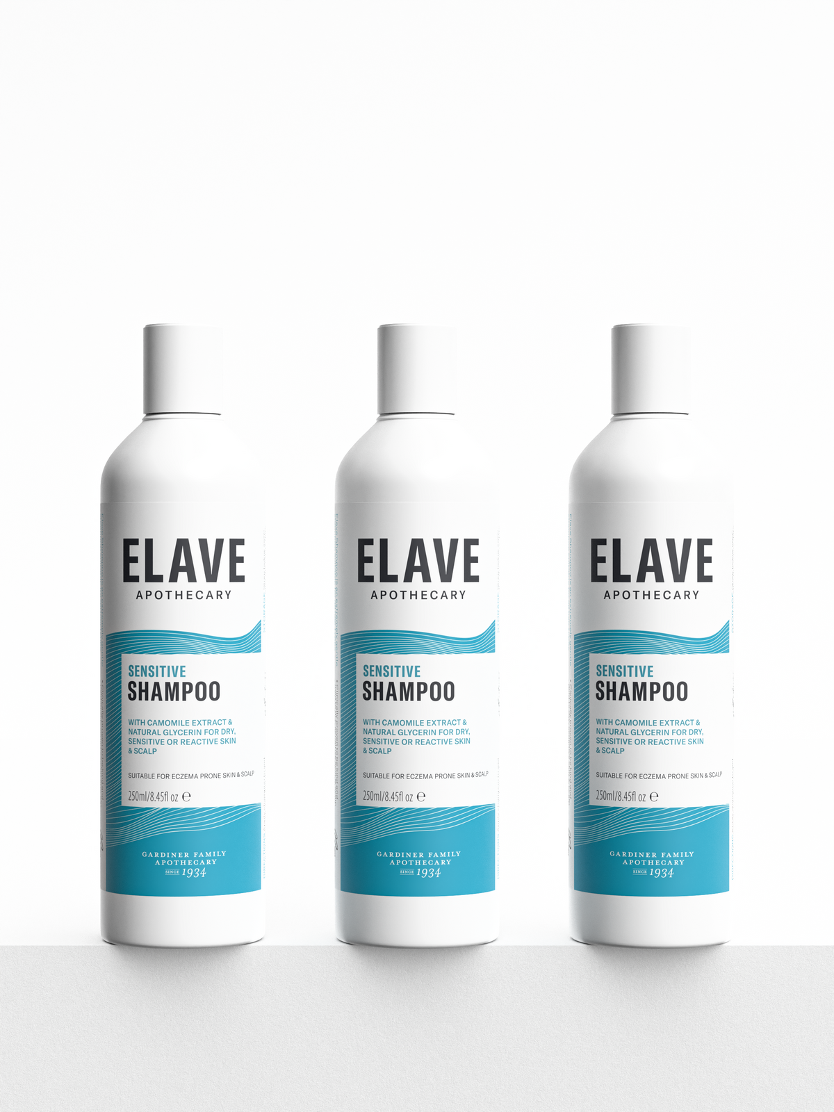 Three Elave Sensitive Shampoo bottles in a row