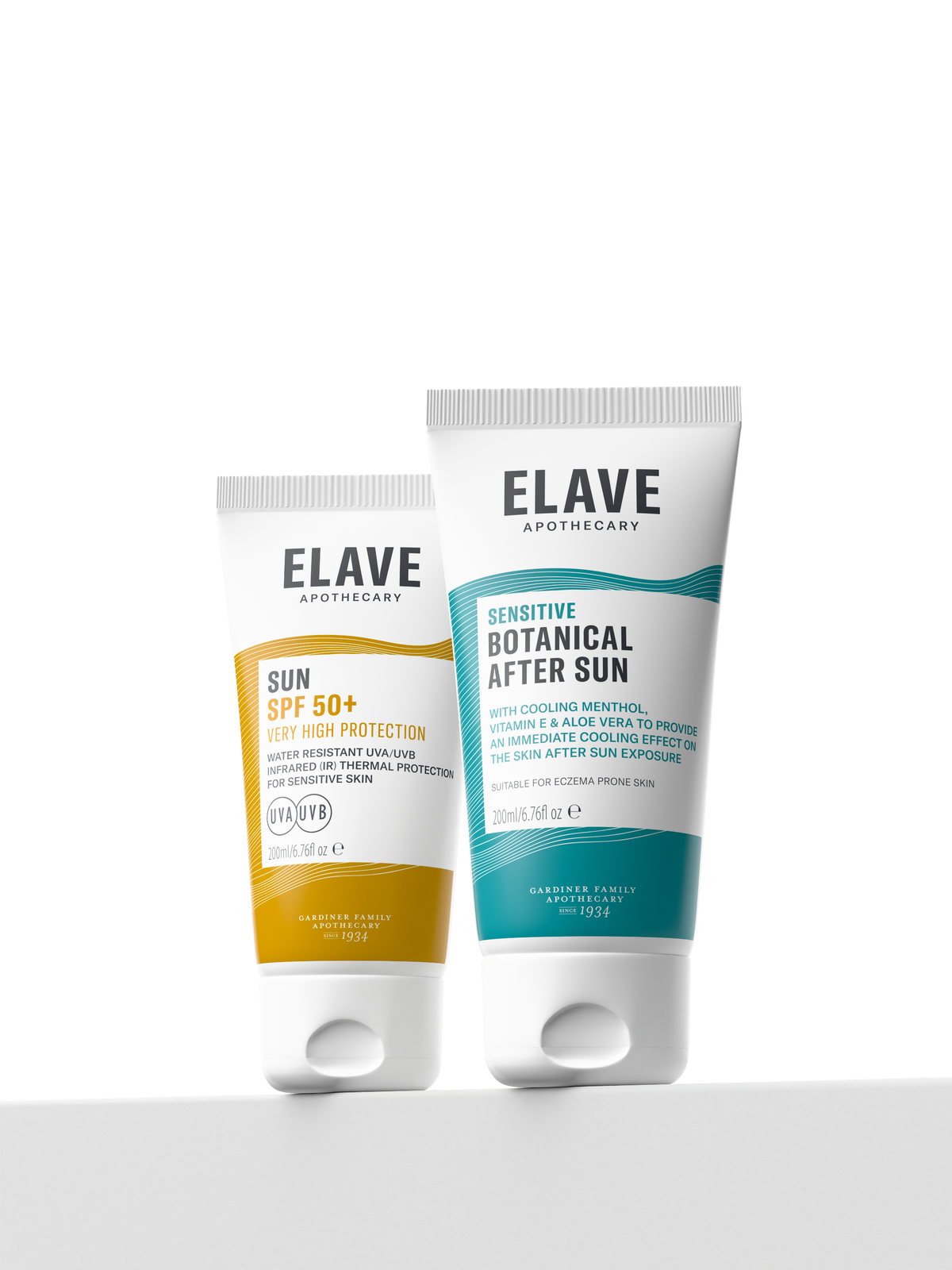 Elave Sun SPF 50+ and Sensitive Botanical After Sun tubes on a white ledge